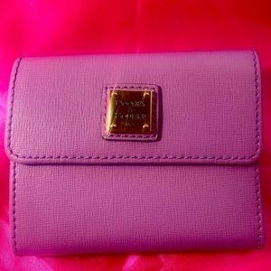 Dooney wallet never used pretty lilac color